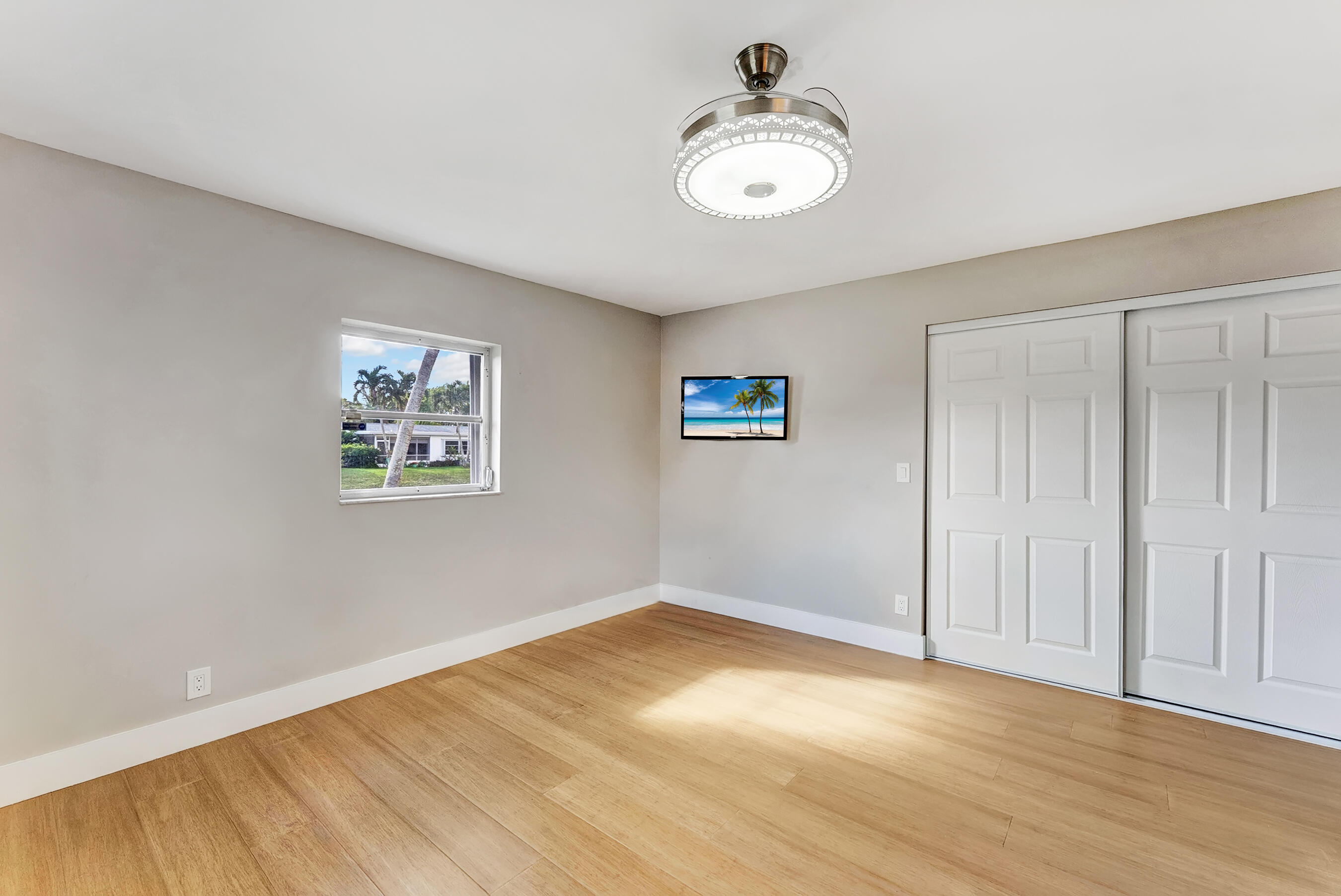 14263 El Clavel Way Delray Beach, FL 33484 - Photo 27 of 39 a view of empty room with wooden floor