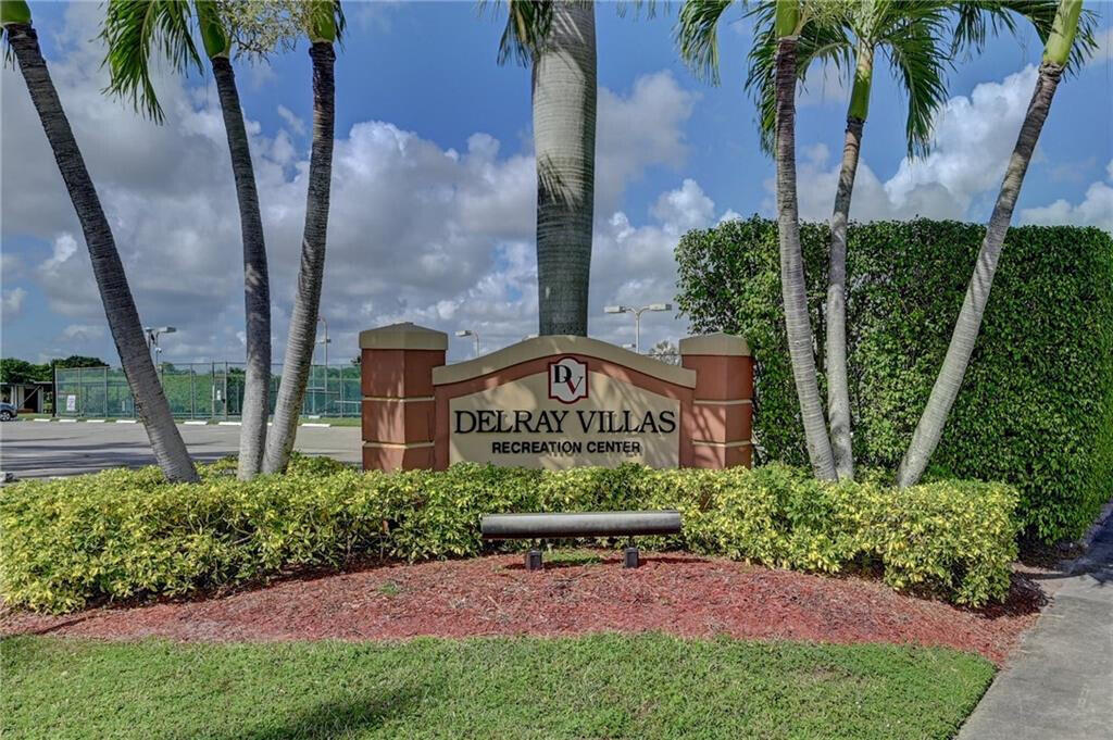 14263 El Clavel Way Delray Beach, FL 33484 - Photo 31 of 39 a view of a chairs in front of house