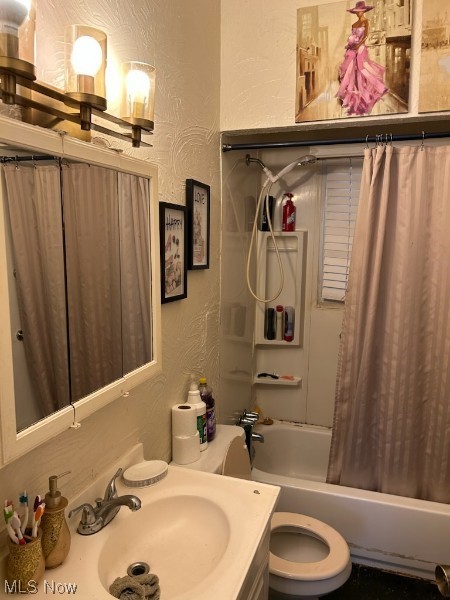 3439 Fulton Road Cleveland, OH 44109 - Photo 15 of 19 Full bathroom featuring shower / bathtub combination with curtain, vanity with extensive cabinet space, and toilet