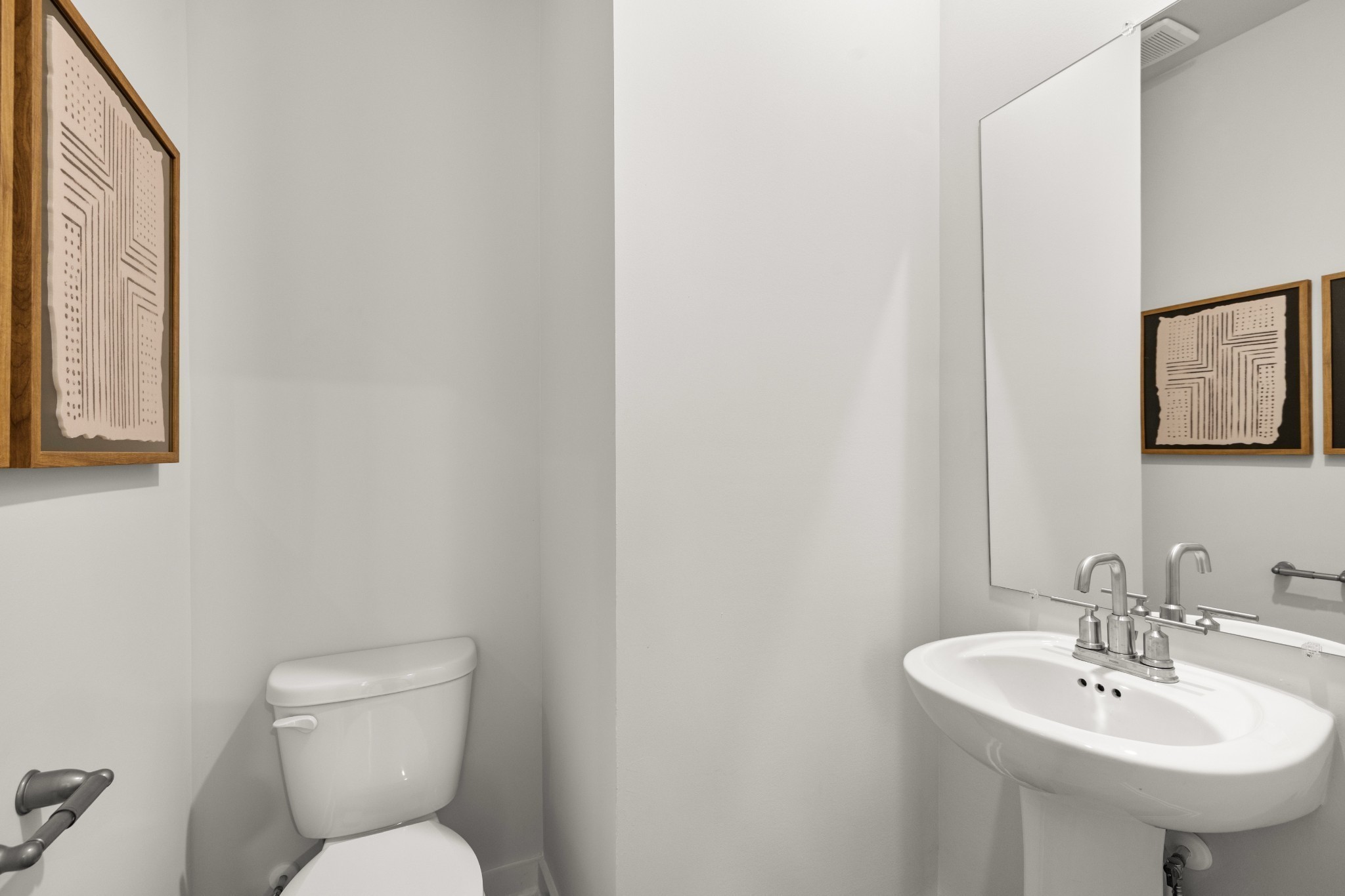 3440 Shigo Street Murfreesboro, TN 37130 - Photo 35 of 69 a bathroom with a toilet sink and mirror