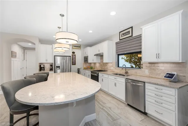 $1,155,000 | 7457 Winding Cypress Drive, Naples, FL 34114