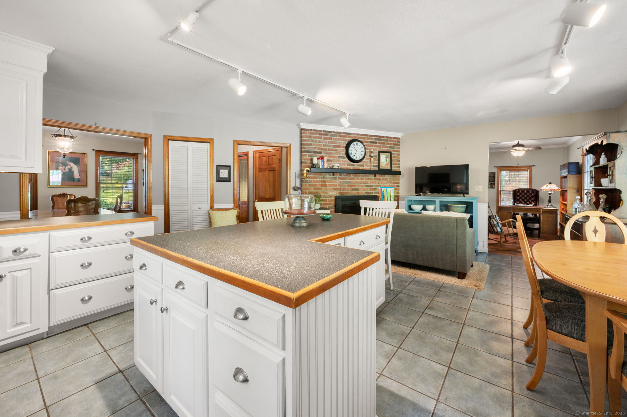 383 Lathrop Road Plainfield, CT 06374 - Photo 14 of 40 a kitchen with cabinets and window