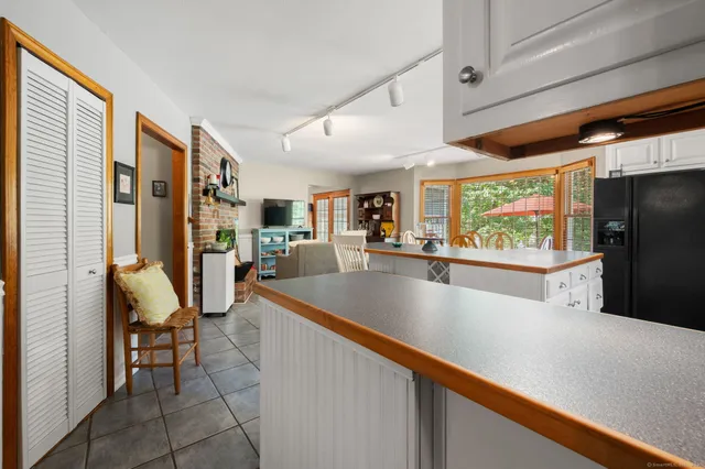 a view of a living room and dining room