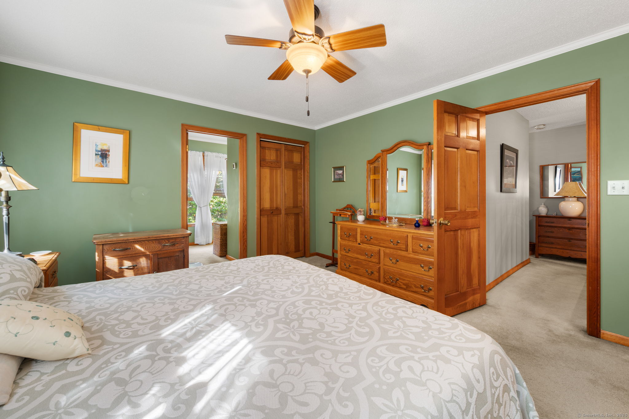 383 Lathrop Road Plainfield, CT 06374 - Photo 24 of 40 a bedroom with a bed and wooden floor