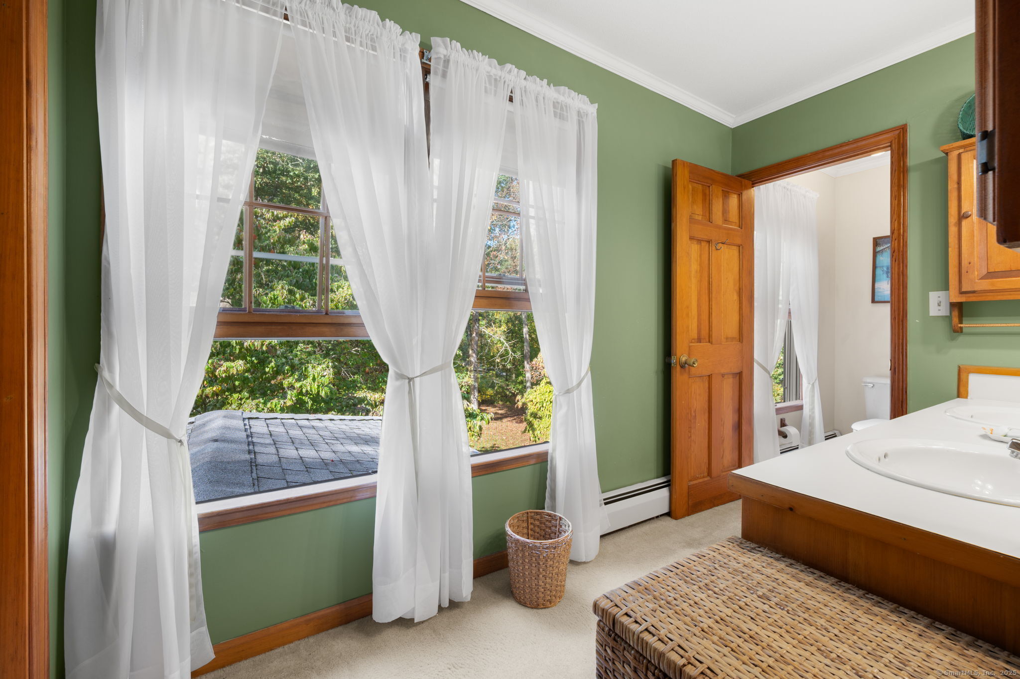 383 Lathrop Road Plainfield, CT 06374 - Photo 27 of 40 a bedroom with a bed and a window