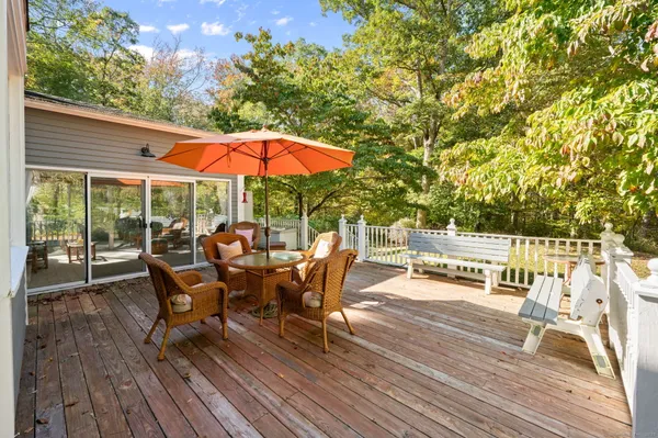 a view of a house with sitting area and furniture