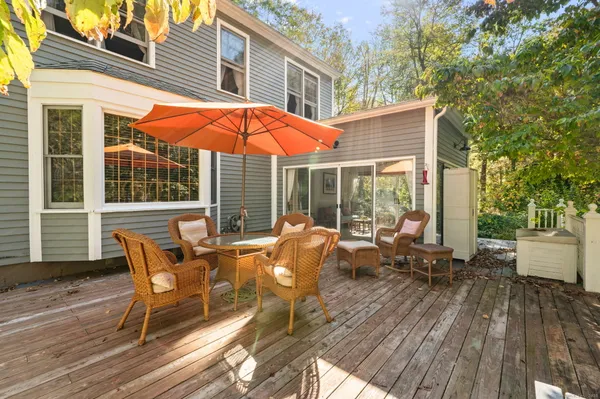 a house view with swimming pool in the back
