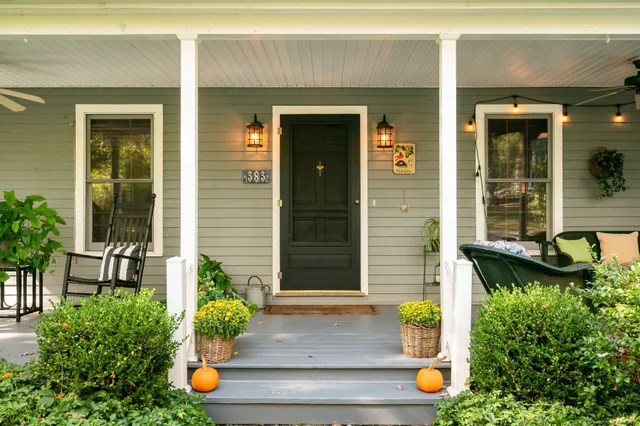 a front view of a house with garden