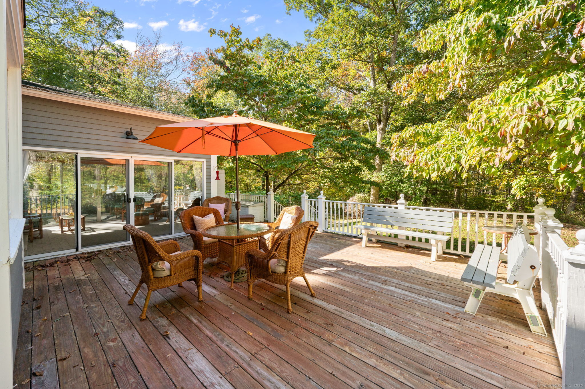383 Lathrop Road Plainfield, CT 06374 - Photo 35 of 40 a patio with wooden floor and yard