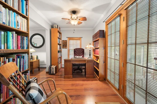 a view of living room kitchen and entryway