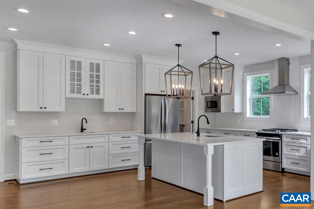 3 Rothwell Lane, Unit LOT 3 Crozet, VA 22932 - Photo 2 of 33 a kitchen with counter top space cabinets and stainless steel appliances