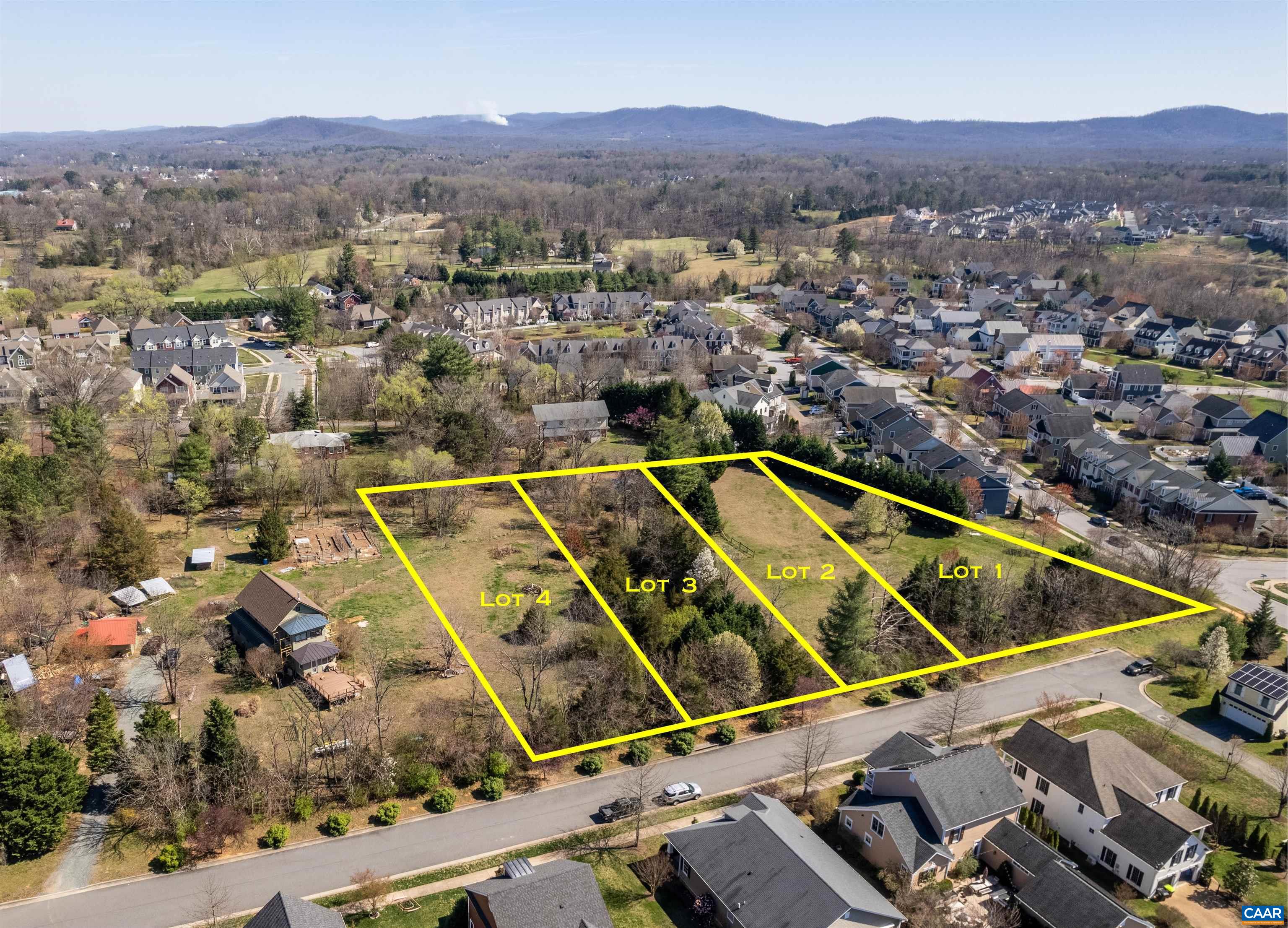 3 Rothwell Lane, Unit LOT 3 Crozet, VA 22932 - Photo 31 of 33 an aerial view of houses with a swimming pool and mountain view
