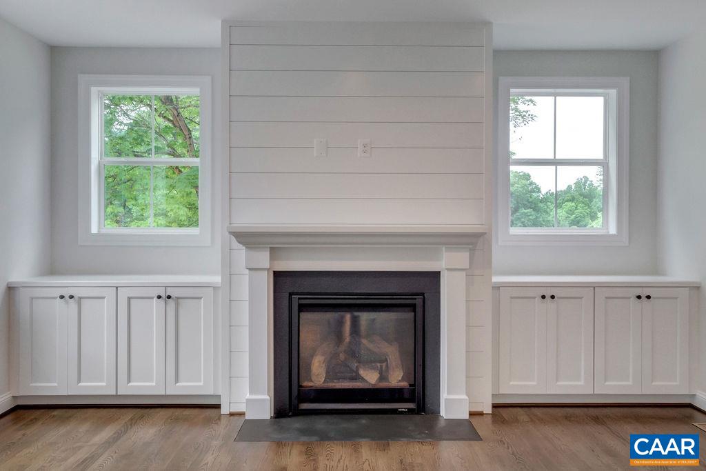 3 Rothwell Lane, Unit LOT 3 Crozet, VA 22932 - Photo 10 of 33 a living room with furniture and a fireplace