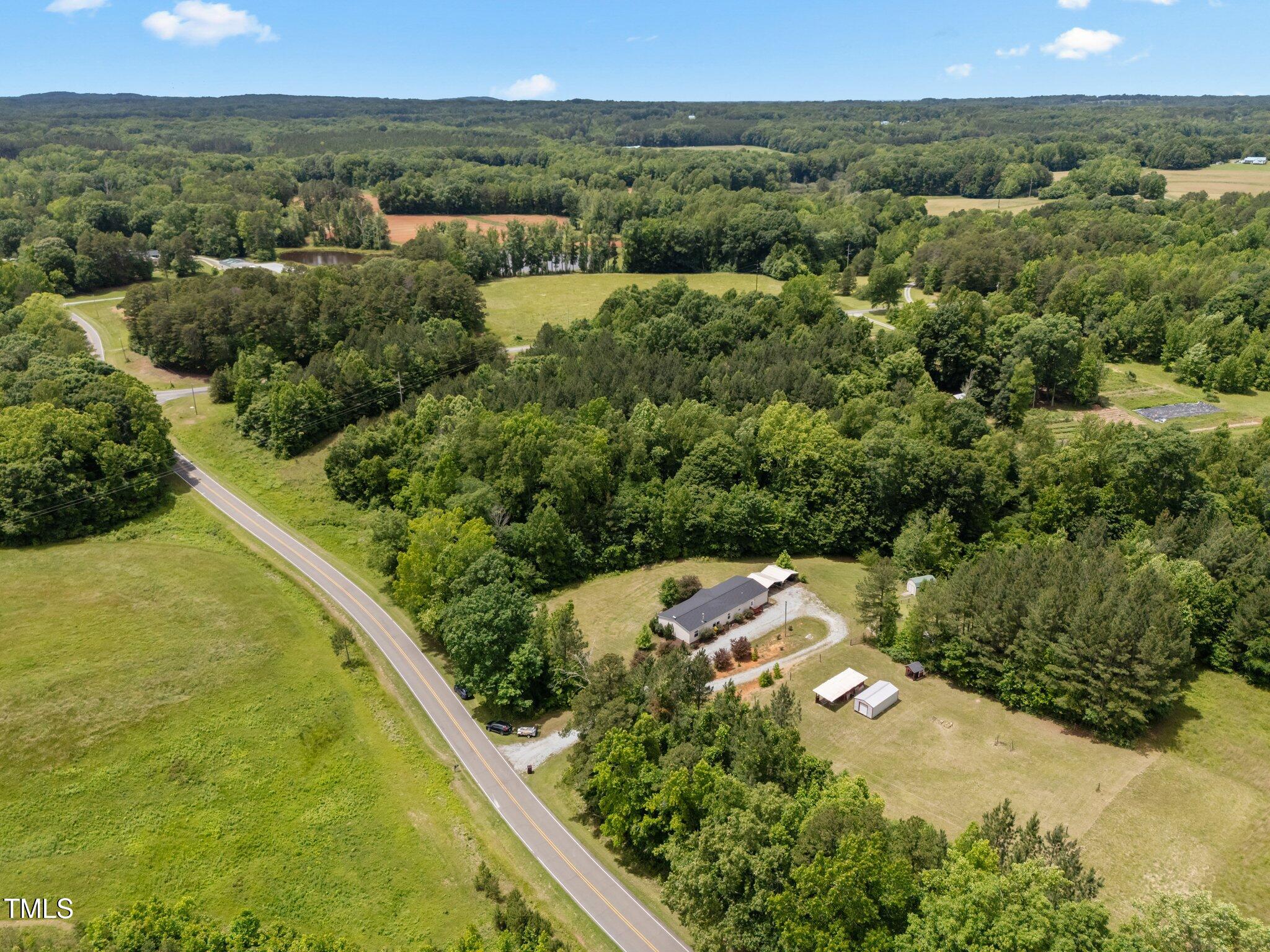 3415 Old Allensville Road Roxboro, NC 27574 - Photo 5 of 44 12-web-or-mls-DJI_20250522135115_0039_D