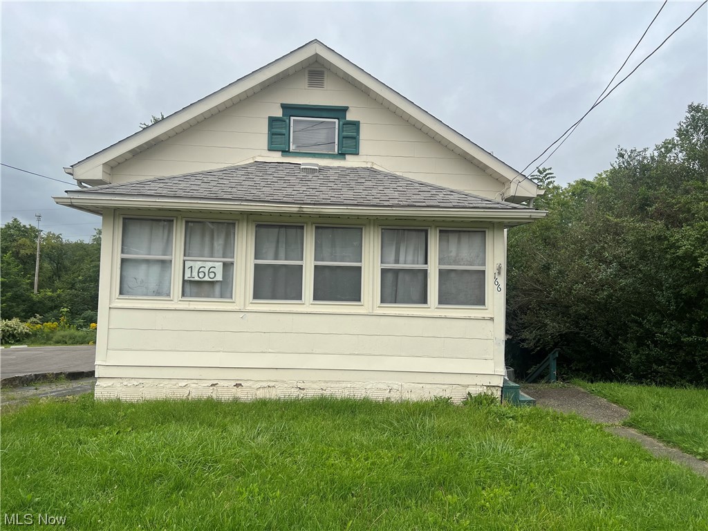 166 Lowellville Road Struthers, OH 44471 - Photo 1 of 1 View of side of property with a yard