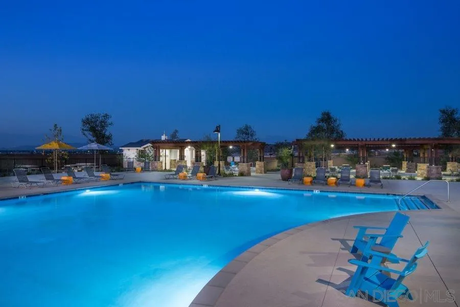 24384 Crooked Trail Menifee, CA 92584 - Photo 12 of 21 a view of a swimming pool with an outdoor seating