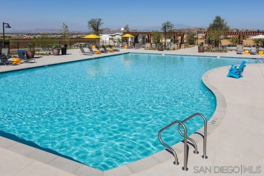 24384 Crooked Trail Menifee, CA 92584 - Photo 16 of 21 a view of a swimming pool and an outdoor seating