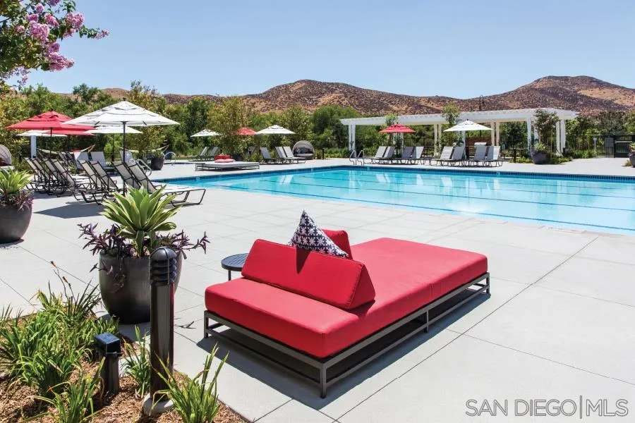 24384 Crooked Trail Menifee, CA 92584 - Photo 17 of 21 a view of a terrace with furniture and a lake view