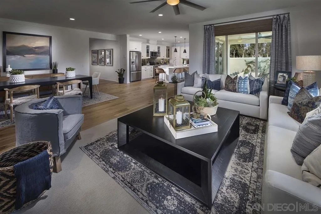 24384 Crooked Trail Menifee, CA 92584 - Photo 5 of 21 a living room with furniture and a large window