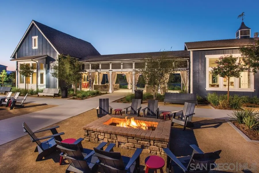 24384 Crooked Trail Menifee, CA 92584 - Photo 10 of 21 a view of a patio with table and chairs potted plants and a table and chairs
