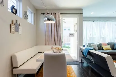 a living room with furniture and a window