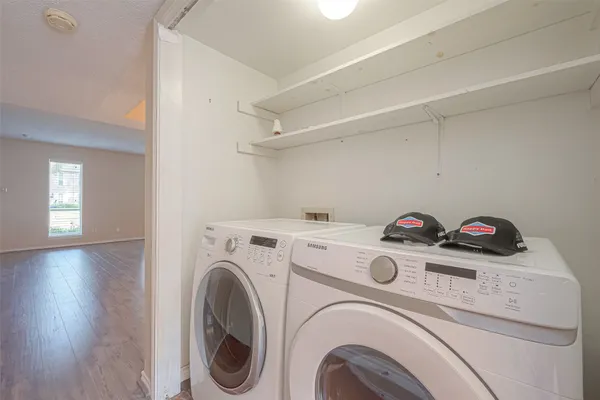 a utility room with dryer and washer