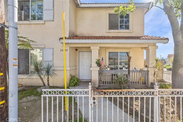 a front view of a house with a porch