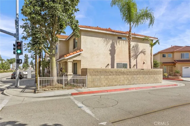 front view of a house with a street