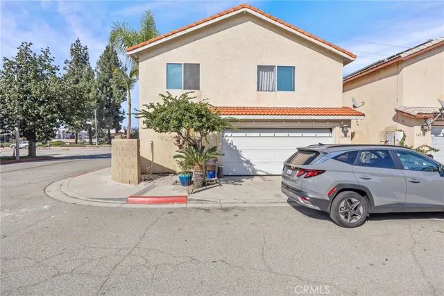 a front view of a house with a garage