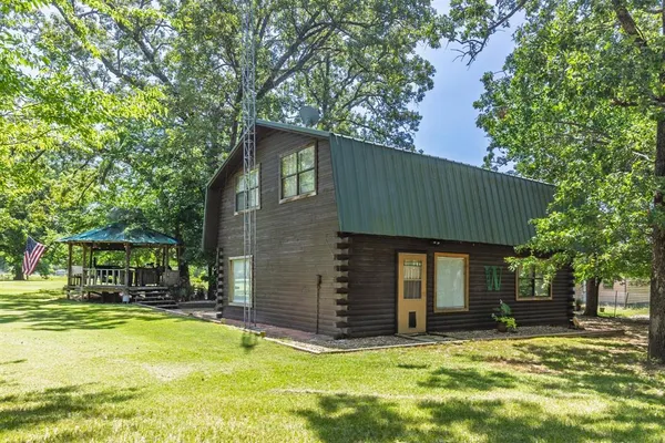 a view of a house with a swimming pool