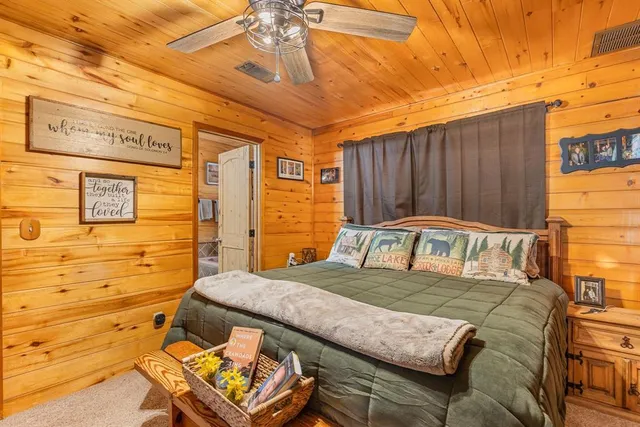 a view of a patio with a table and chairs