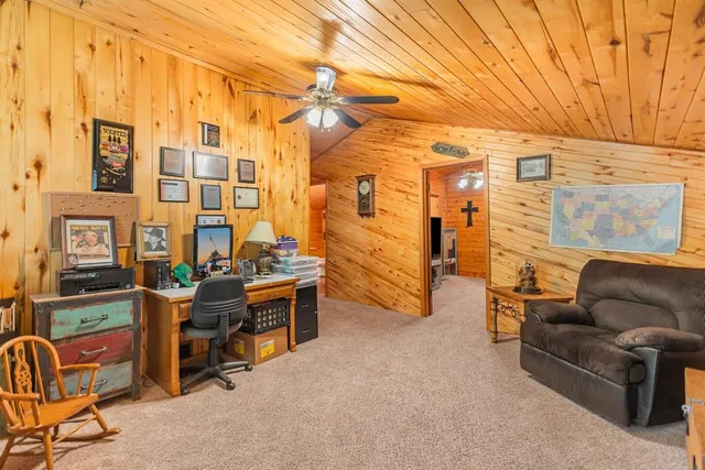a view of a livingroom with furniture and a couch