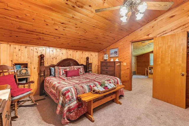 a bedroom with a bed and a walk in closet