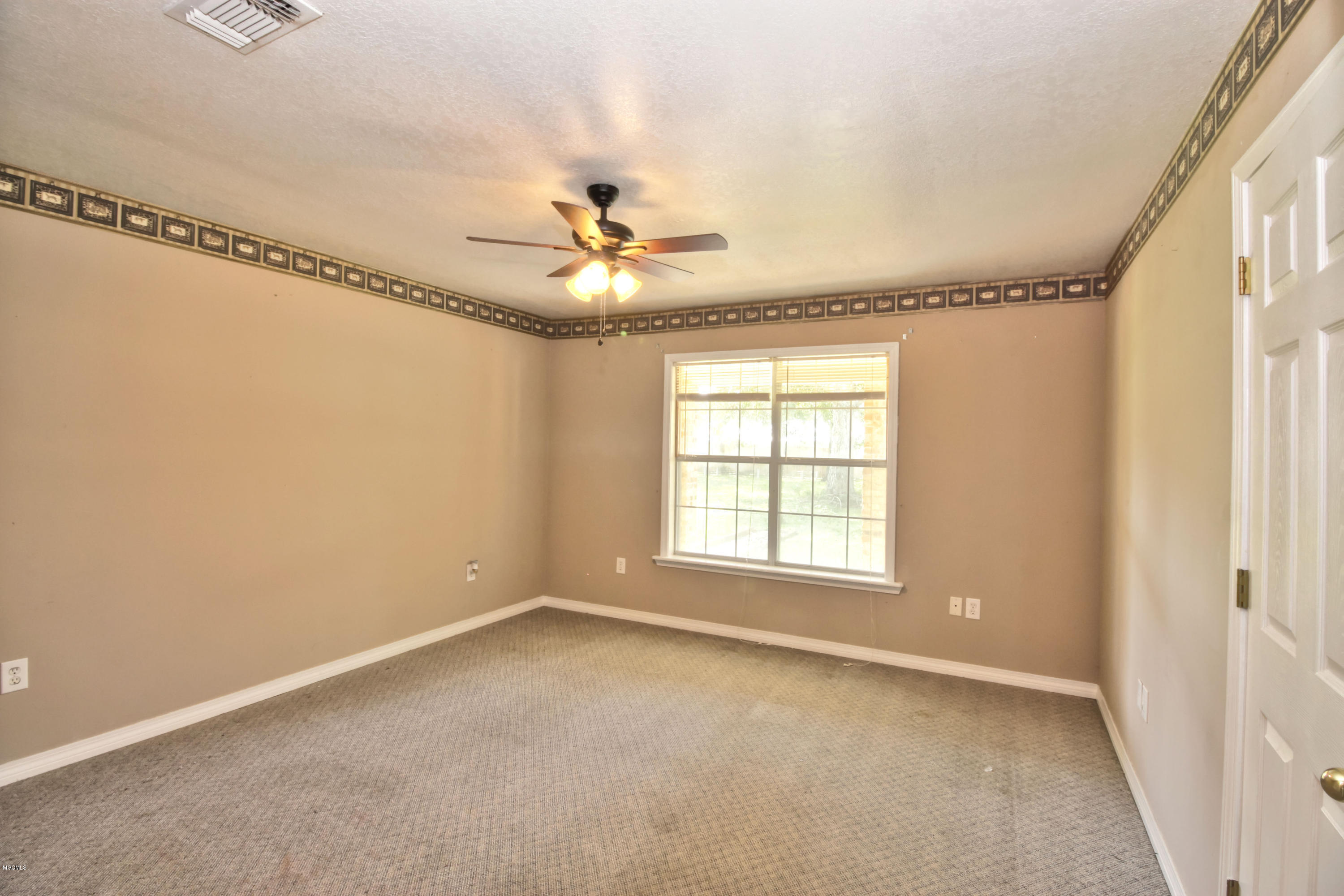 9107 Nannys Road Vancleave, MS 39565 - Photo 22 of 22 Spare Bedroom