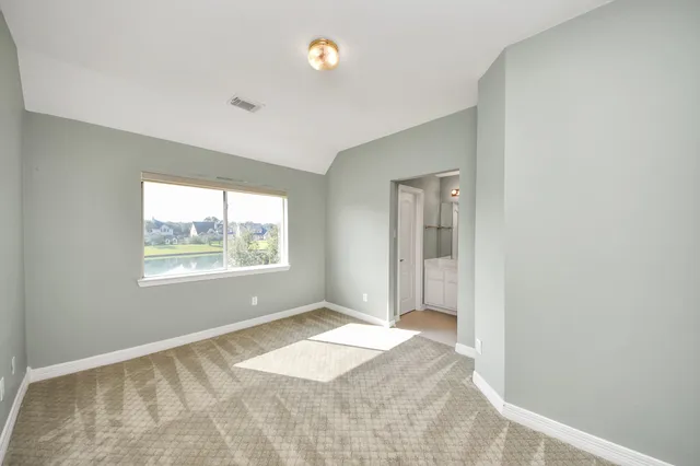 a view of a room that has a window in it