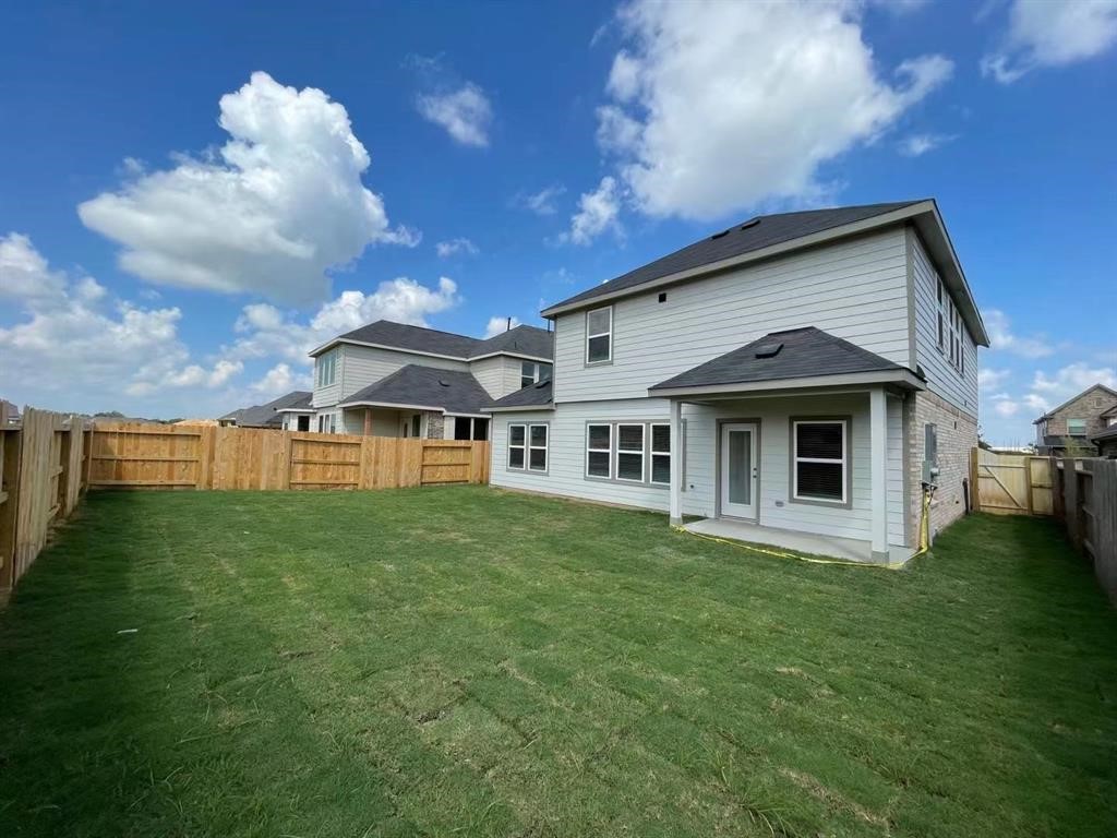 815 Summer Village Way Rosenberg, TX 77469 - Photo 21 of 21 a front view of a house with a yard