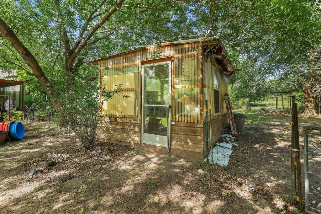252 Meadow Lake Estates Road Denison, TX 75021 - Photo 15 of 37 Out door building that can be used for your next hobby, green house, storage, etc