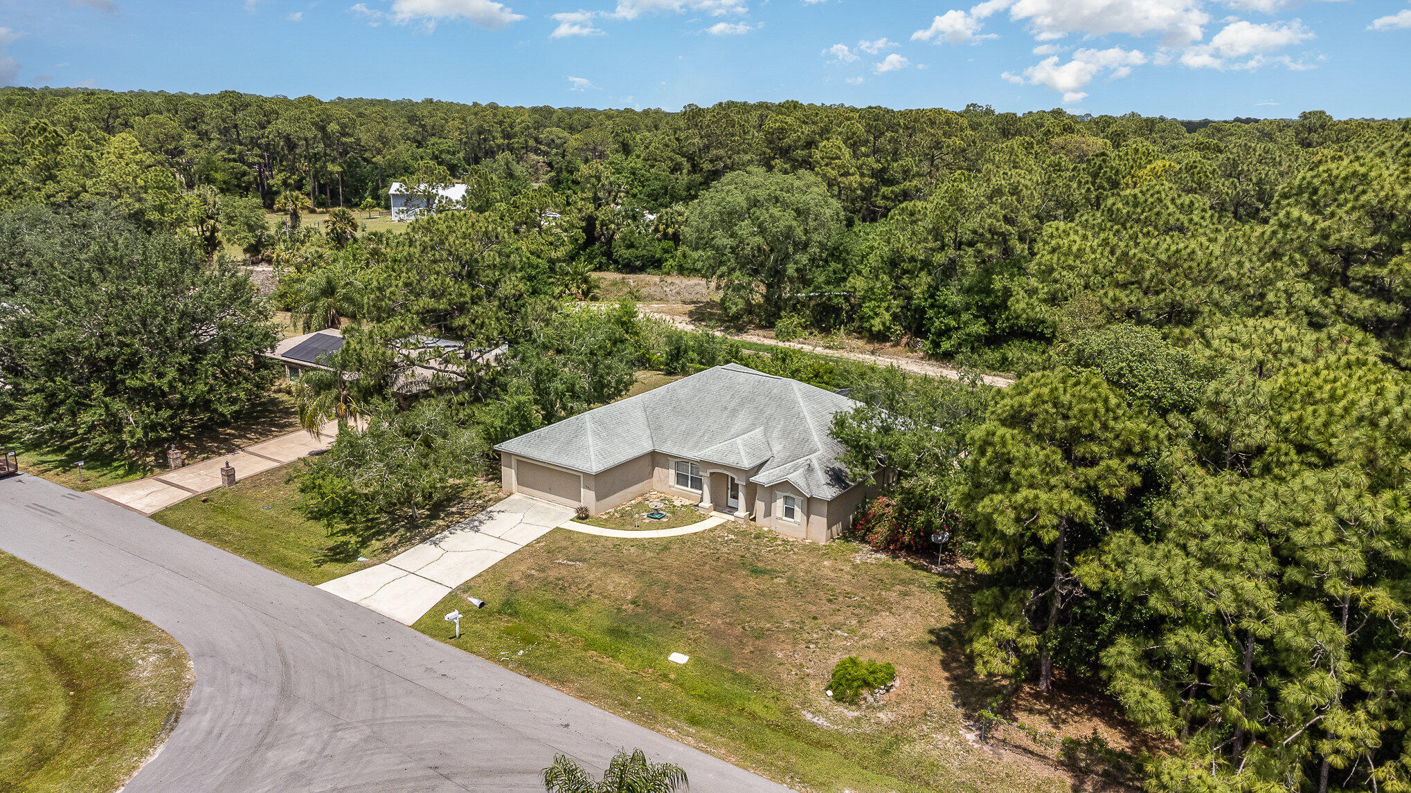 697 Furth Road Northwest Palm Bay, FL 32907 - Photo 23 of 24 a view of a back yard from a balcony