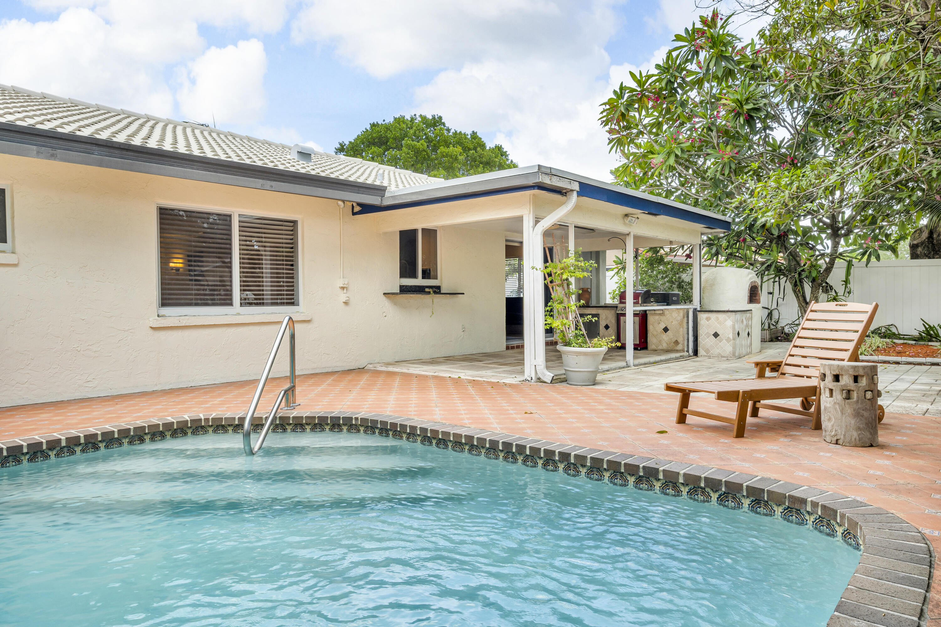 2558 Northwest 32nd Street Boca Raton, FL 33434 - Photo 30 of 36 Relax By Pool