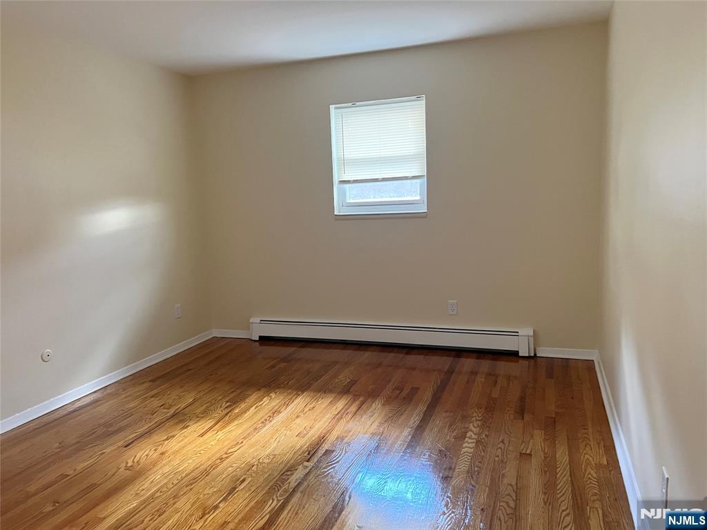 275 River Road, Unit K Bogota, NJ 07603 - Photo 3 of 8 wooden floor in a room