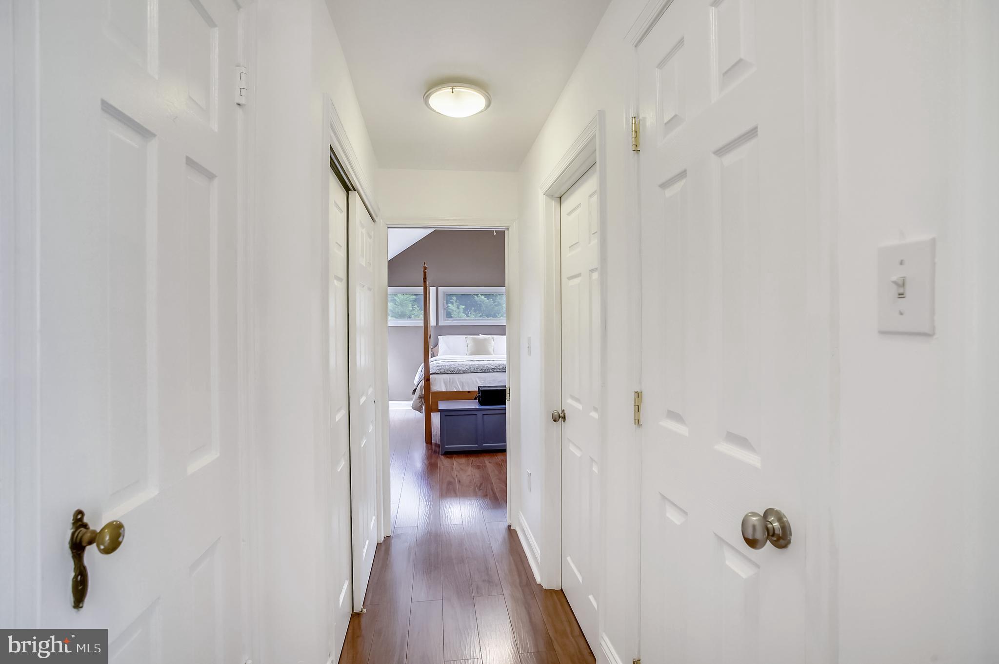 307 Weatherbee Road Towson, MD 21286 - Photo 22 of 36 Hallway With Closets To Primary Bedroom