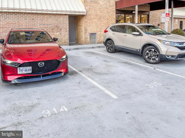 a view of car parked in a parking lot