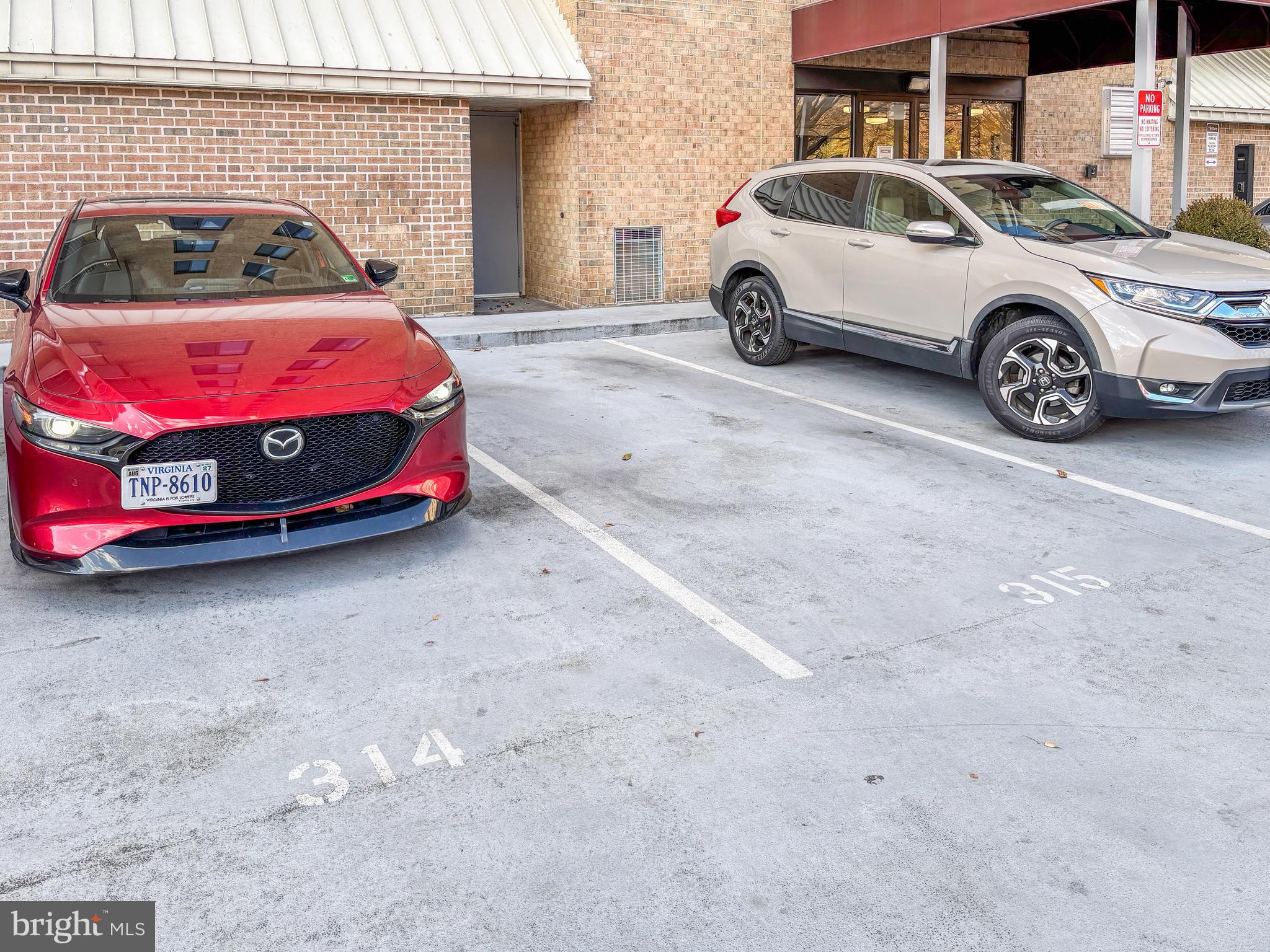 4500 South Four Mile Run Drive, Unit 222 Arlington, VA 22204 - Photo 24 of 41 a car parked in parking