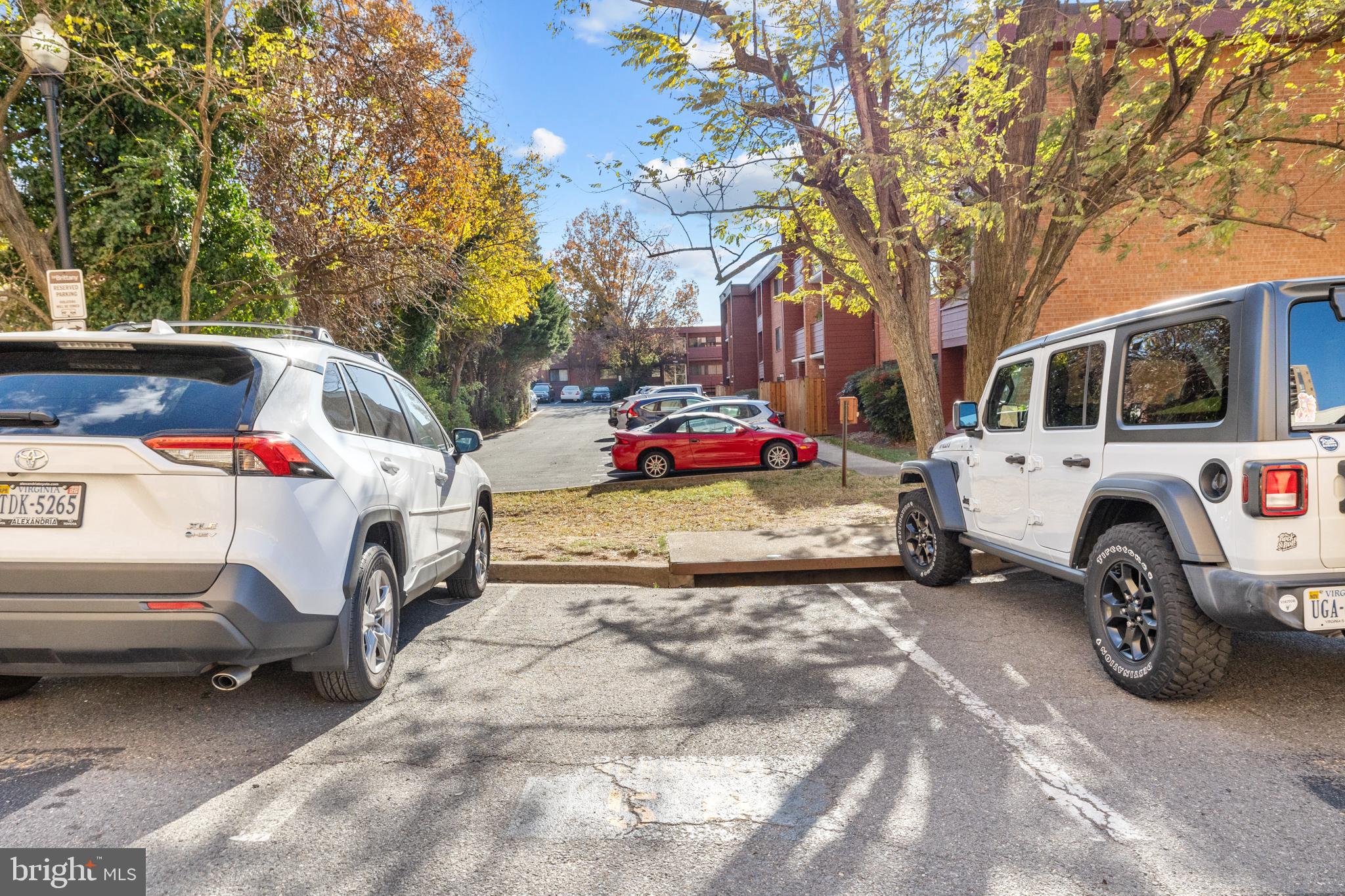 4500 South Four Mile Run Drive, Unit 222 Arlington, VA 22204 - Photo 25 of 41 a view of car parked in a parking lot