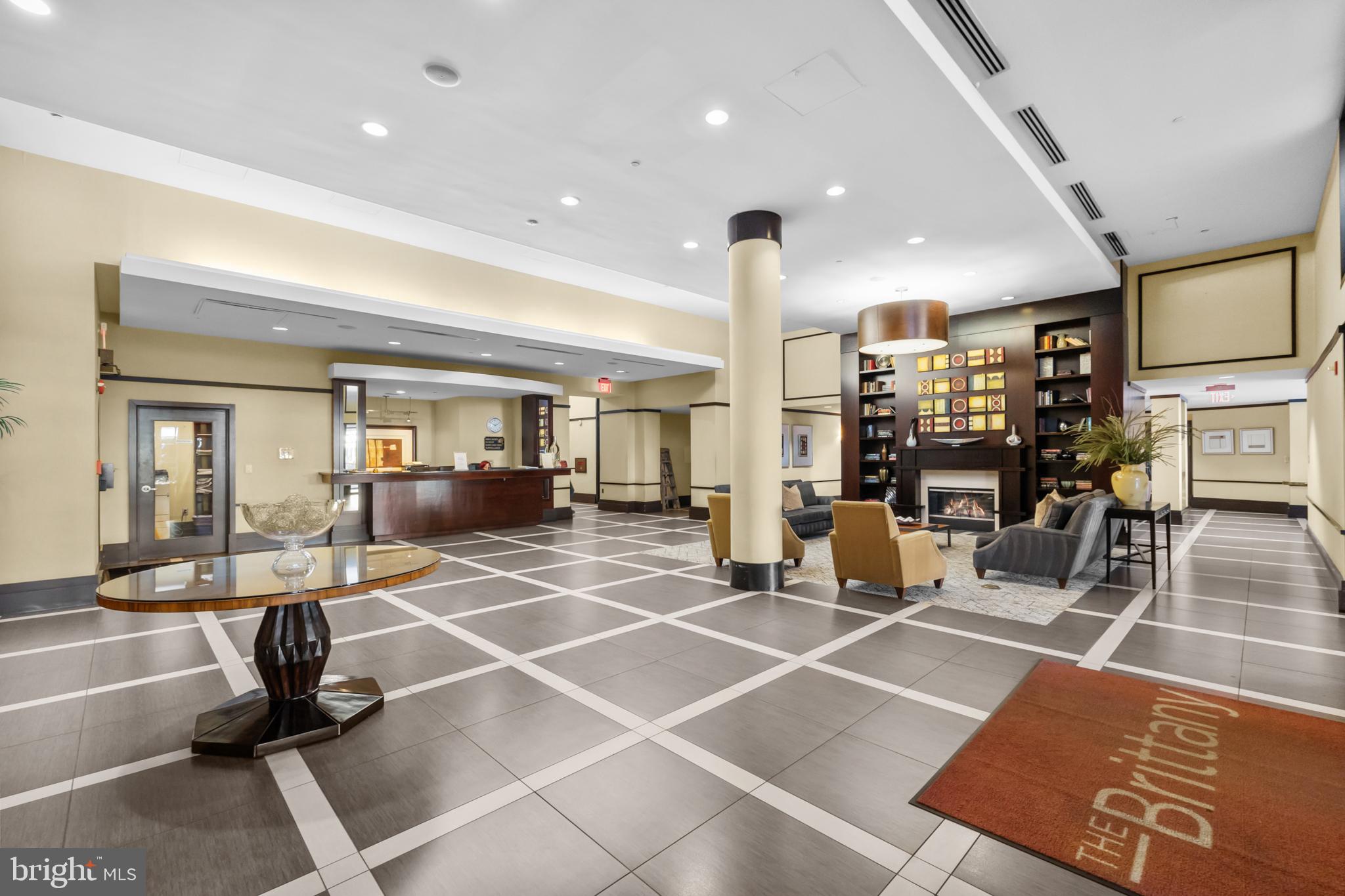 4500 South Four Mile Run Drive, Unit 222 Arlington, VA 22204 - Photo 4 of 41 a room with lots of tables and chairs