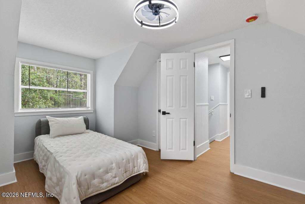 43739 Ratliff Road Callahan, FL 32011 - Photo 48 of 55 a bedroom with a bed and a window