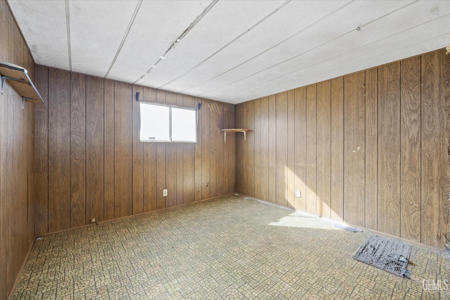 Undisclosed Address Bakersfield, CA 93312 - Photo 13 of 26 an empty room with windows
