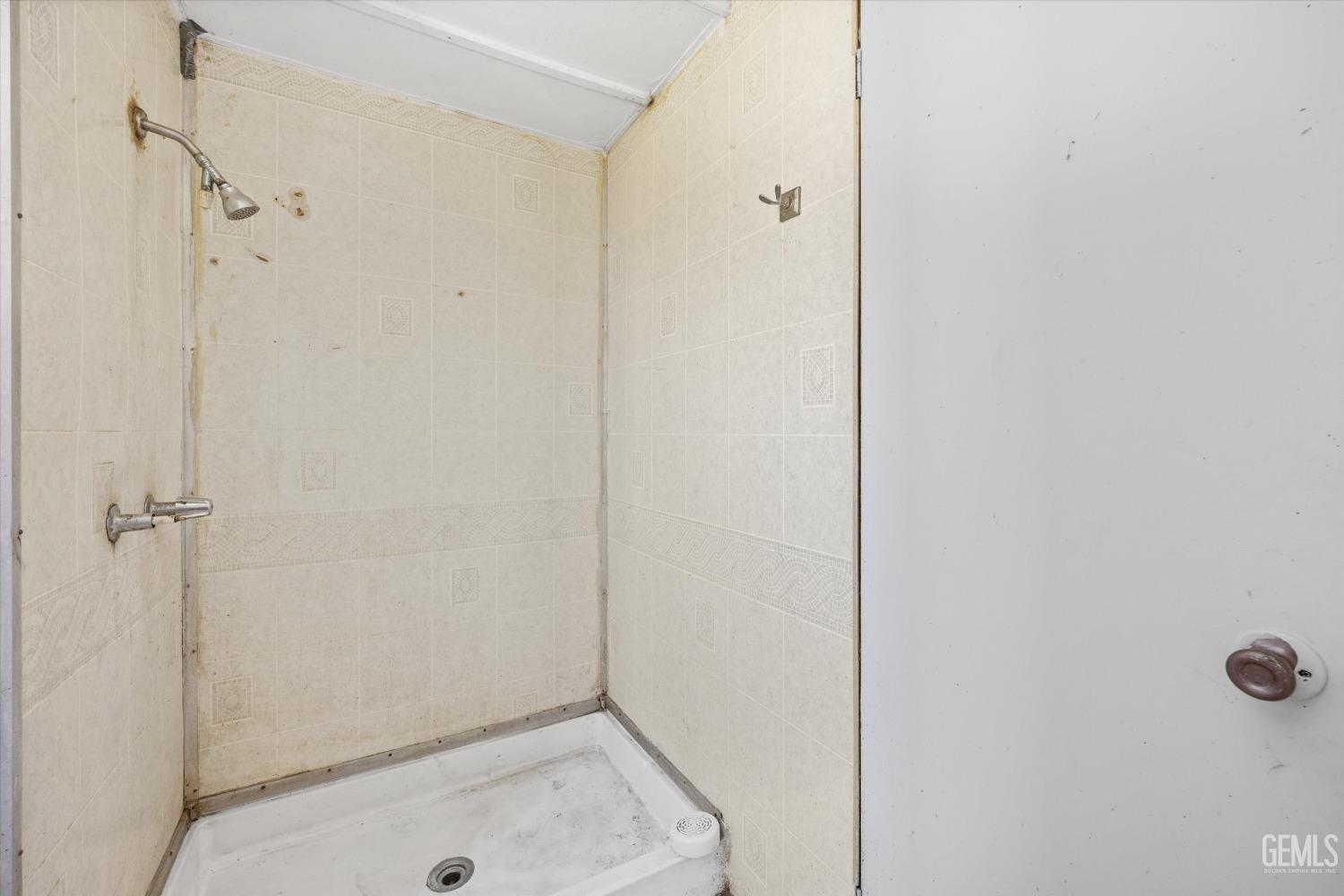 Undisclosed Address Bakersfield, CA 93312 - Photo 14 of 26 a bathroom with a tub