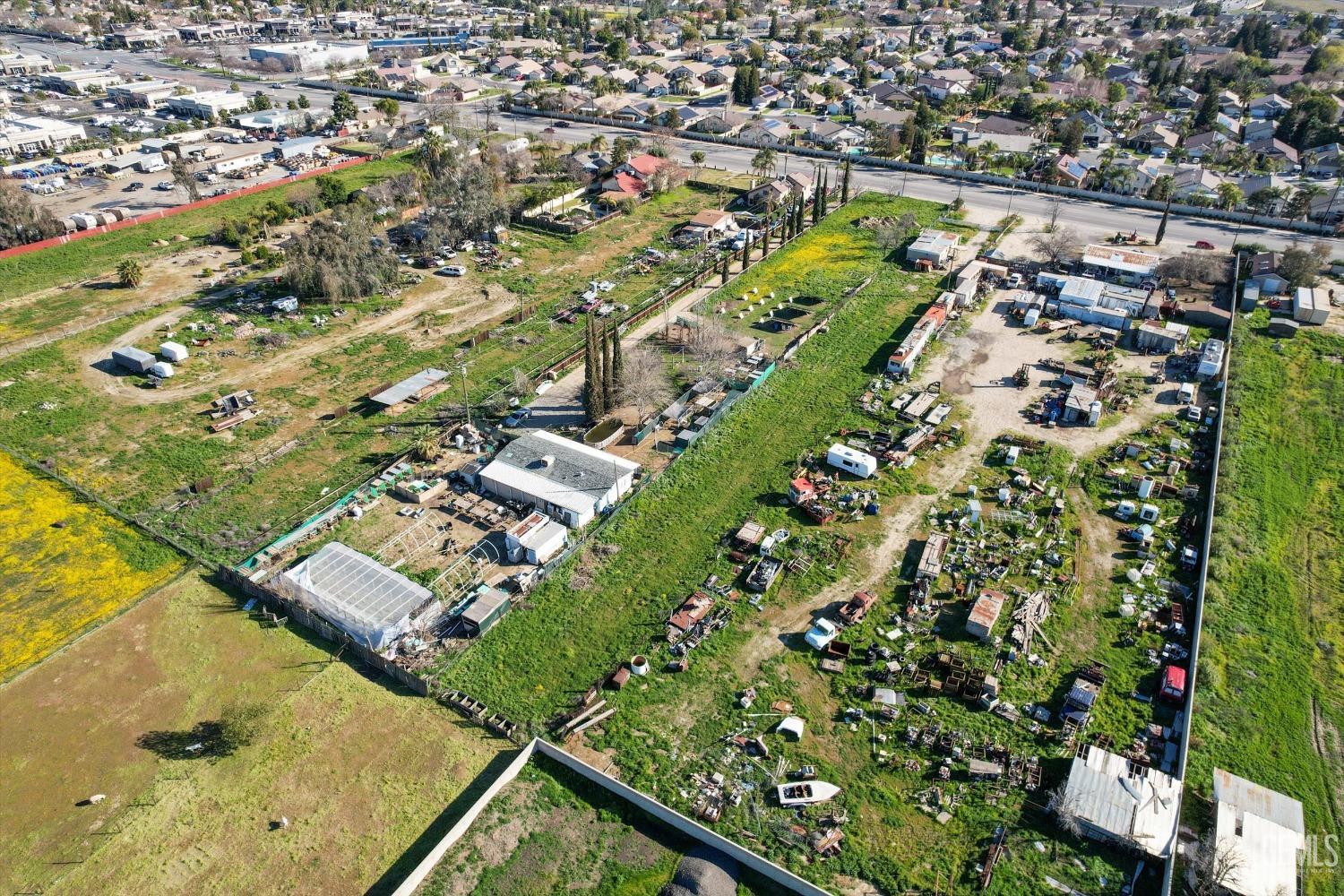 Undisclosed Address Bakersfield, CA 93312 - Photo 22 of 26 an aerial view of residential houses with outdoor space