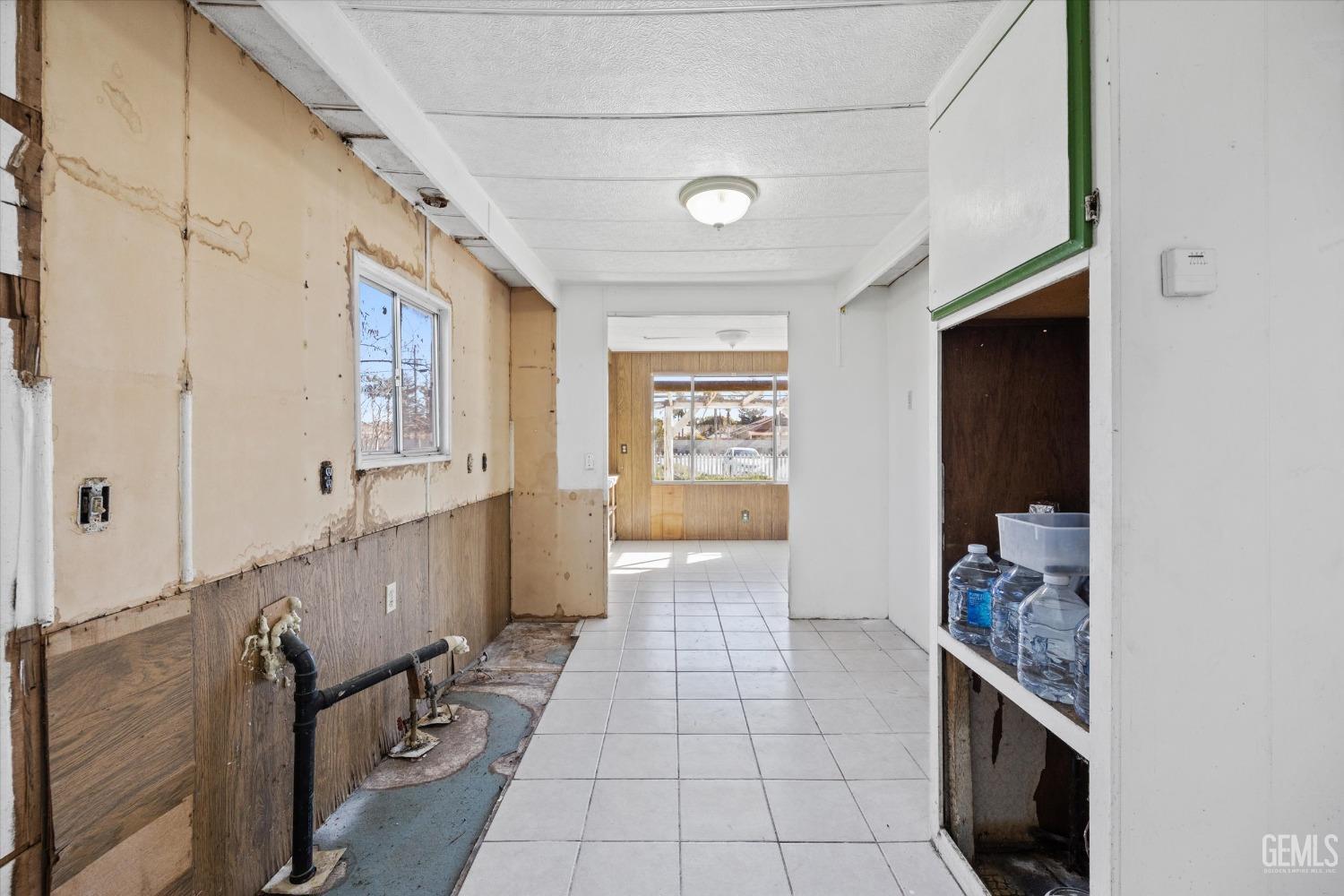 Undisclosed Address Bakersfield, CA 93312 - Photo 10 of 26 a bathroom with a sink a mirror and a bathtub